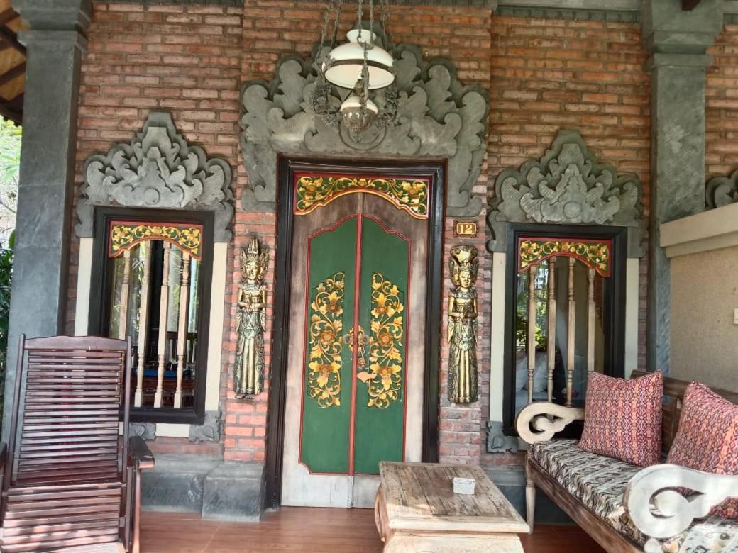 Отель Tirta Sari Bungalow Пемутеран Экстерьер фото